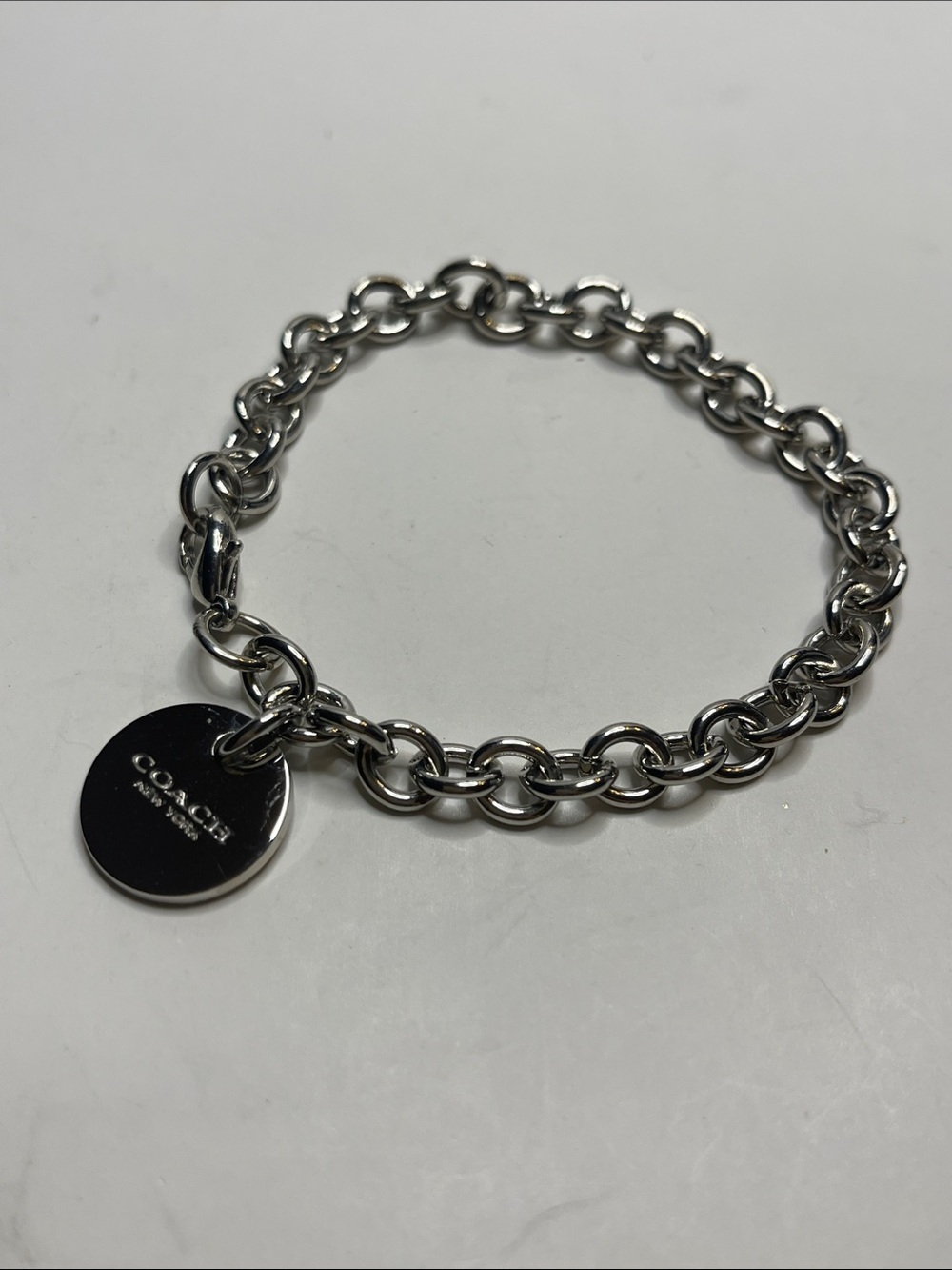 Coach Silver-Tone Round Logo Link Bracelet